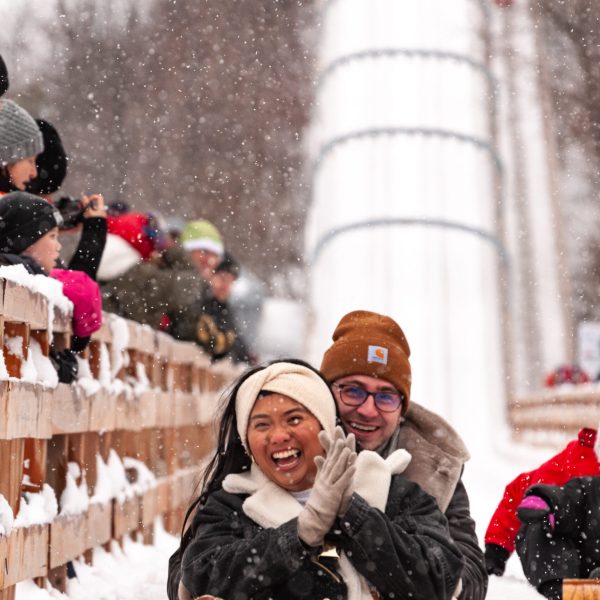 a group of people that are standing in the snow