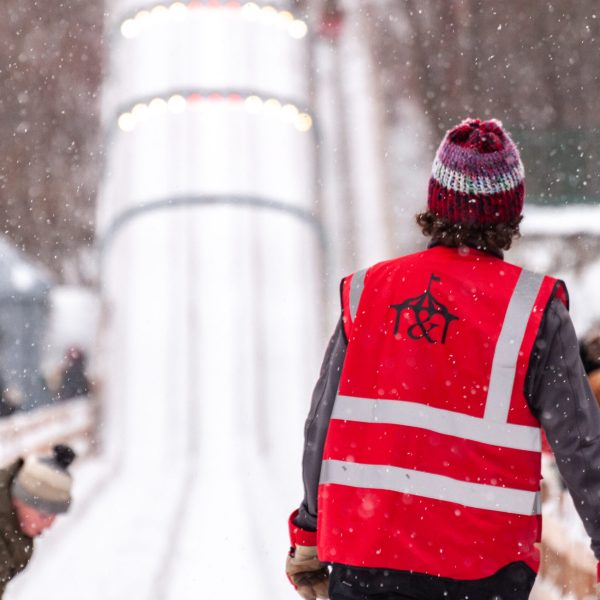 a group of people that are standing in the snow