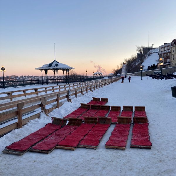 a bench covered in snow