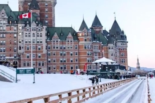 a group of people walking in the snow