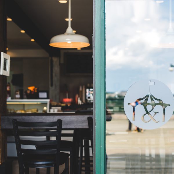 a dining room table in front of a window