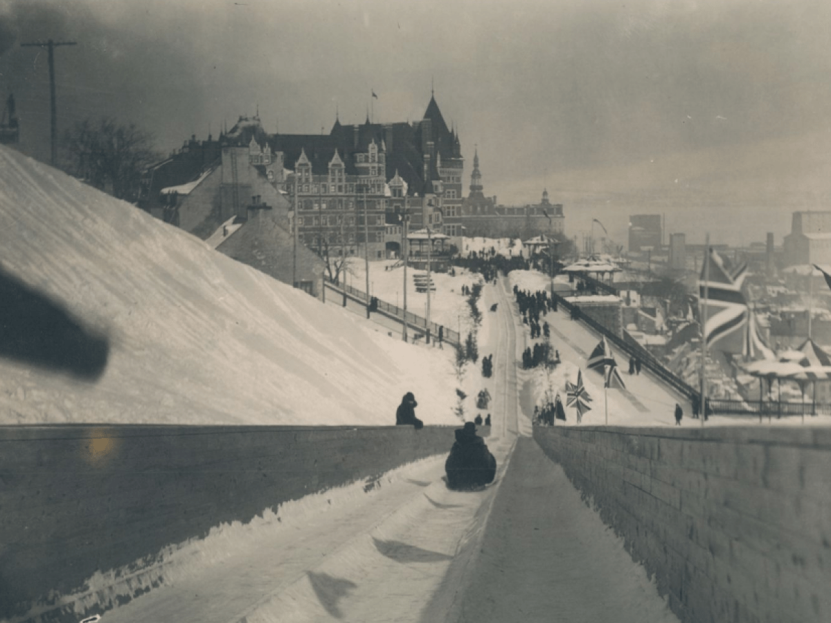 a vintage photo of a man riding a skateboard on a ramp
