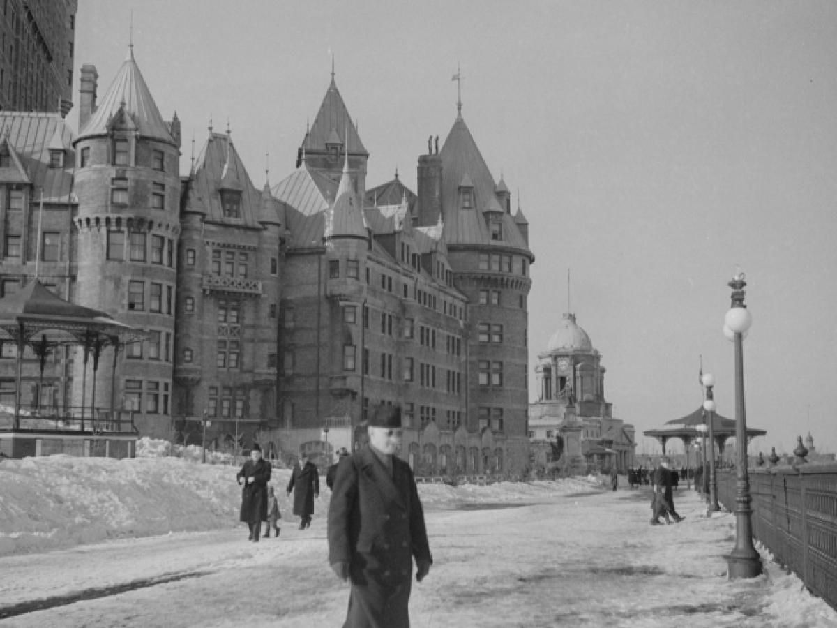 a man standing in front of a building