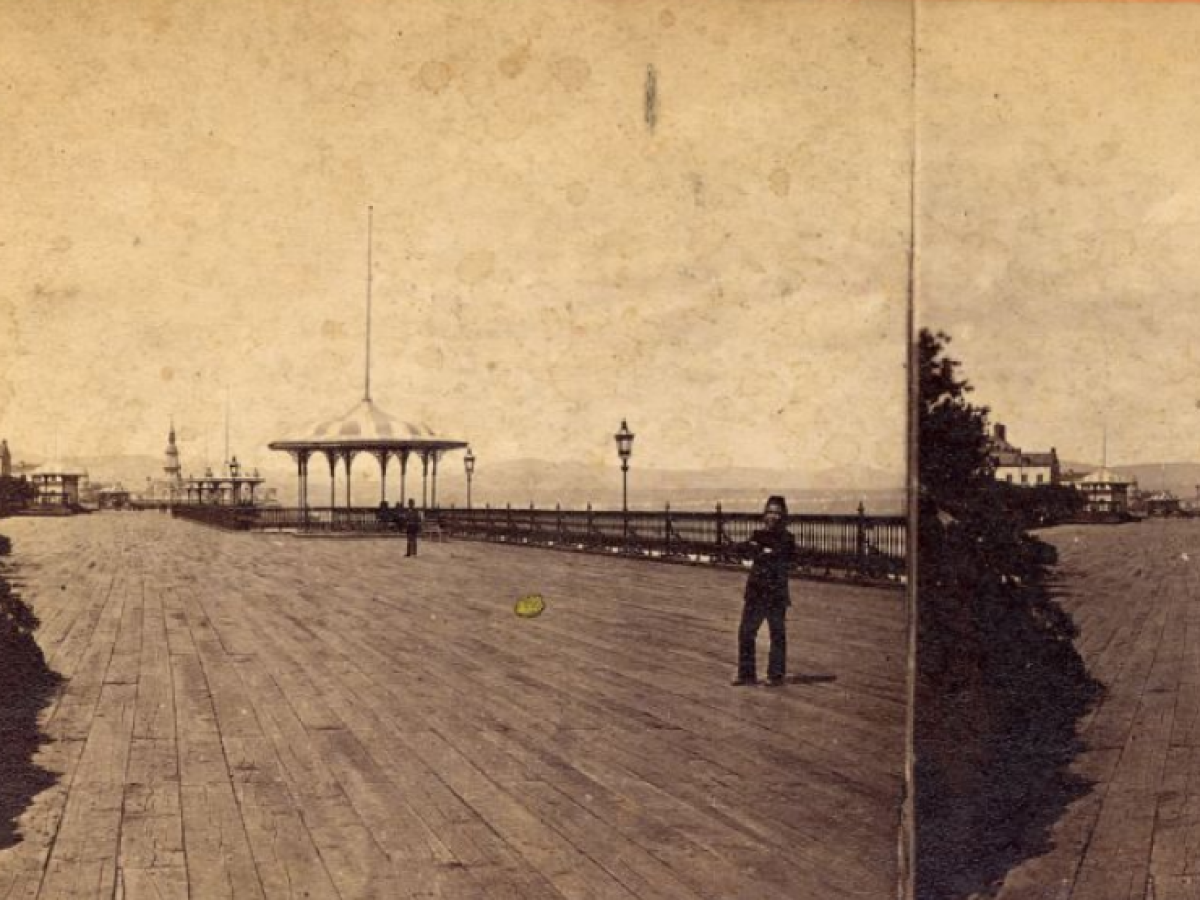 a man standing in front of a building