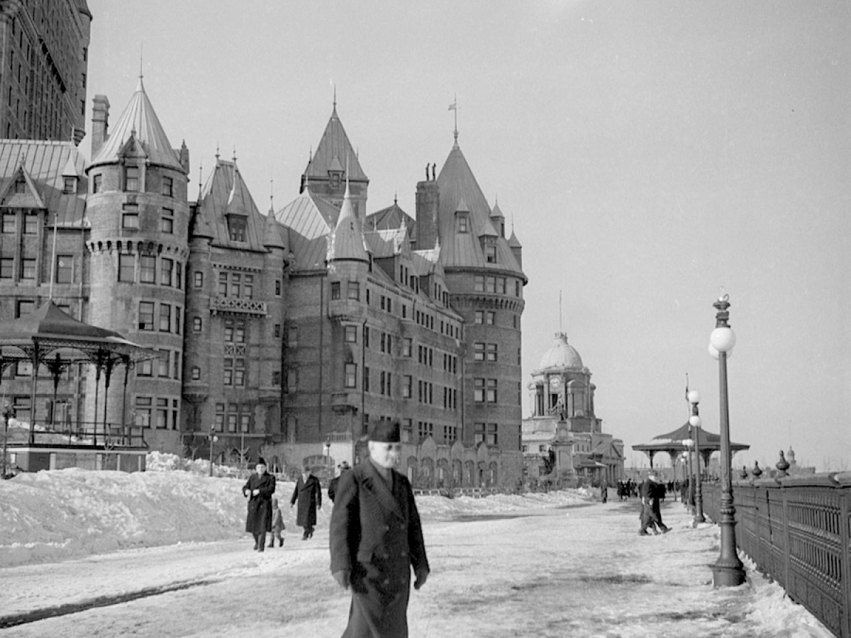 a vintage photo of a person walking down the street