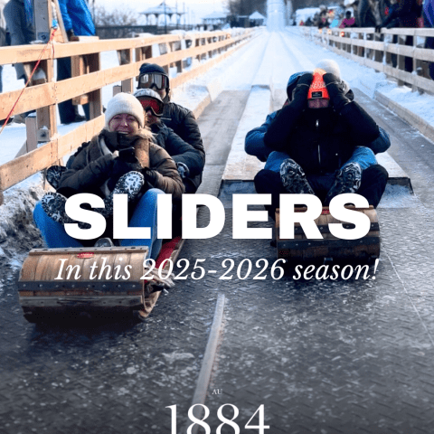People sledding on a snowy track promoting the 2025-2026 season, text: 'SLIDERS' and 'since 1884'.