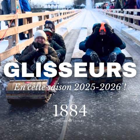 People sitting on sleds on an ice slide, with text overlay and snowy background.