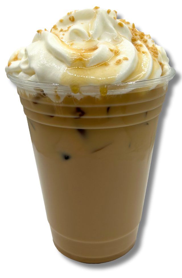Iced caramel latte with whipped cream in a clear cup.